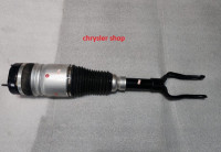 levý přední tlumič / měch /11-15/